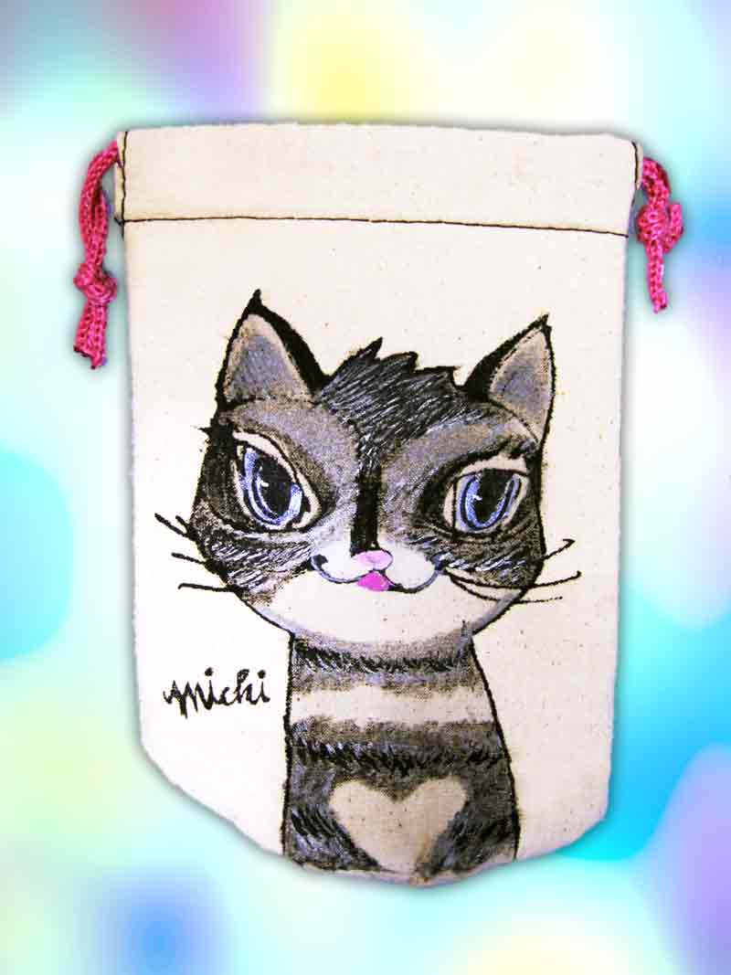 青い目をしたつり目をしたキジ猫　中尾道也